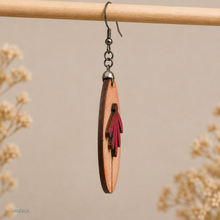 Cargar imagen en el visor de la galería, Side view of Mauve Blossom wooden earring showing the 2.5 mm wood thickness, raised layered petals, and double-sided construction.