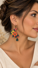 Cargar imagen en el visor de la galería, Model wearing Moon Flower lightweight layered wooden earrings with a soft cream top