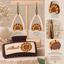 Cargar imagen en el visor de la galería, Sunflower Blessed wooden earrings shown front and back with the same layered sunflower design on both sides, plus a side view highlighting the 2 mm American linden wood thickness and matching hair clip.
